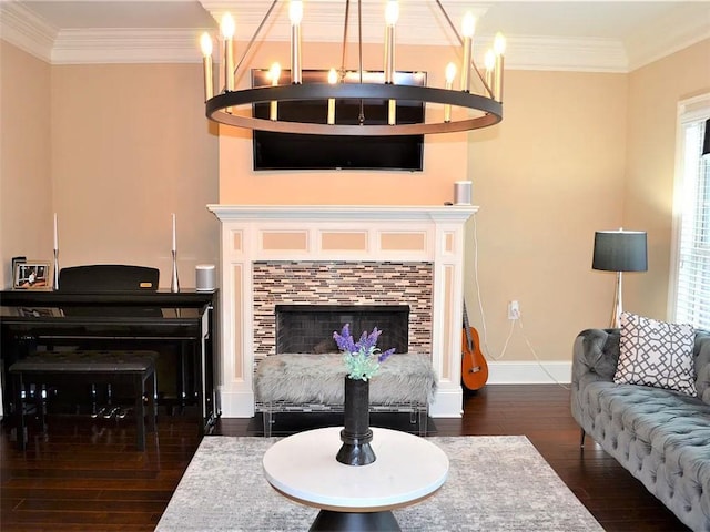1035 Willow Field Ln SE, Marietta, GA 30067 - living room with baseboards, an inviting chandelier, ornamental molding, and wood-type flooring