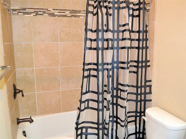 1035 Willow Field Ln SE, Marietta, GA 30067 - bathroom with shower / bath combination with curtain and toilet