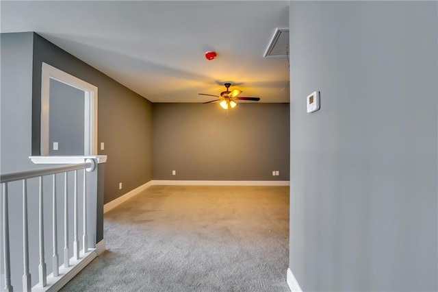 unfurnished room with light carpet