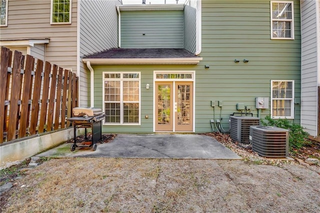 entrance to property featuring a patio area and central AC