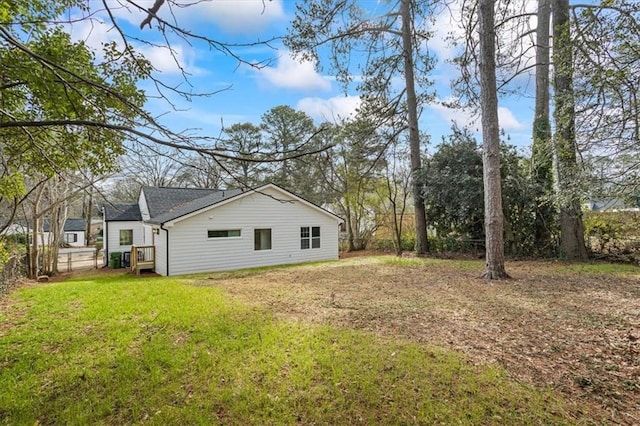 view of home's exterior featuring a yard