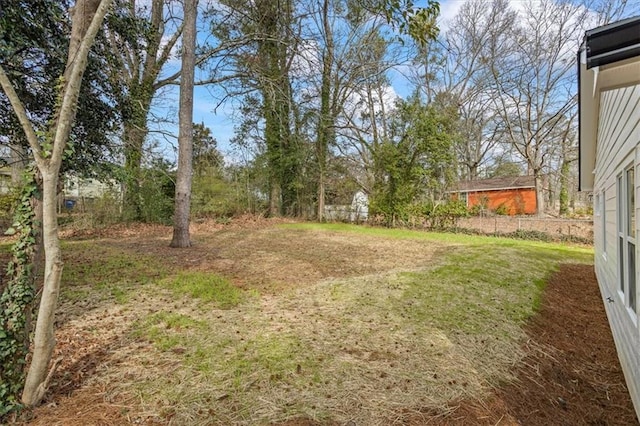 view of yard with fence