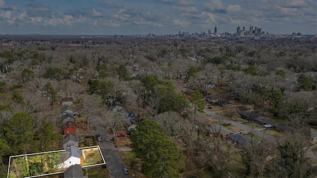 birds eye view of property with a view of city