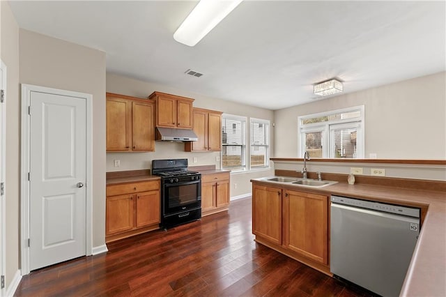 kitchen featuring dark hardwood / wood-style flooring, black range with gas cooktop, dishwasher, and sink