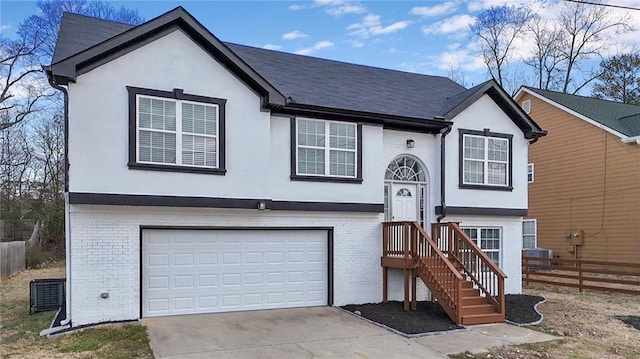 raised ranch featuring a garage