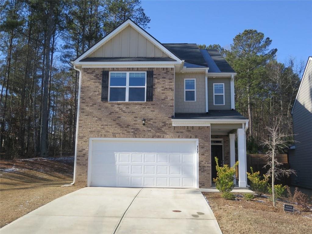 view of front of property featuring a garage