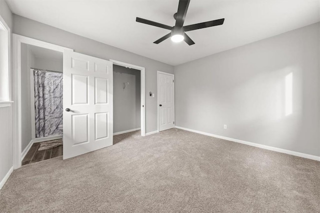 unfurnished bedroom with carpet flooring and ceiling fan