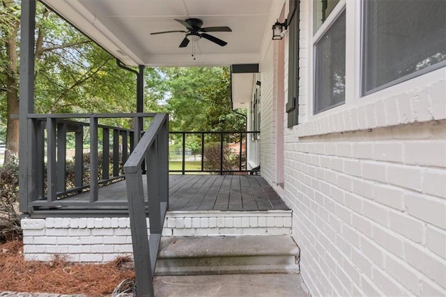 wooden terrace with ceiling fan