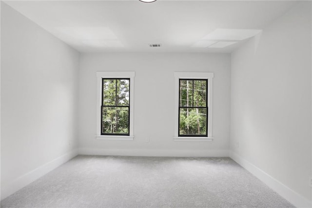 unfurnished room featuring carpet floors