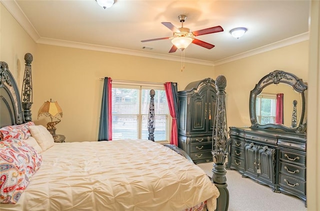 bedroom with carpet flooring, ceiling fan, and ornamental molding