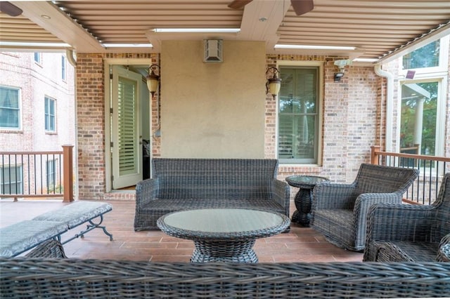 view of patio / terrace featuring ceiling fan