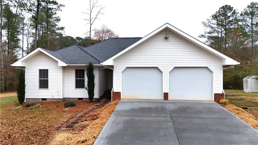 ranch-style home with a garage