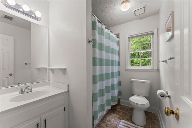 1172 Malvern Hunt Ct, Lawrenceville, GA 30043 - full bathroom with toilet, vanity, tile patterned flooring, a textured ceiling, and a shower with shower curtain