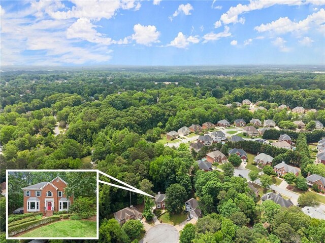 1172 Malvern Hunt Ct, Lawrenceville, GA 30043 - aerial view of property and surrounding area featuring property boundaries highlighted and a heavily wooded area
