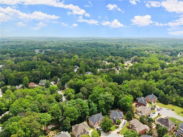 1172 Malvern Hunt Ct, Lawrenceville, GA 30043 - aerial view of residential area featuring a heavily wooded area