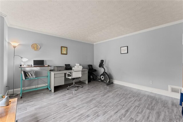 1172 Malvern Hunt Ct, Lawrenceville, GA 30043 - home office with a textured ceiling, wood finished floors, crown molding, and baseboards