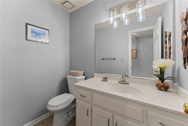 1172 Malvern Hunt Ct, Lawrenceville, GA 30043 - half bath with toilet, vanity, and tile patterned flooring