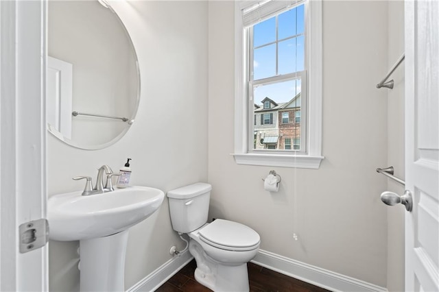 4458 Dunblane Ave, Sugar Hill, GA 30518 - half bath with baseboards and wood finished floors