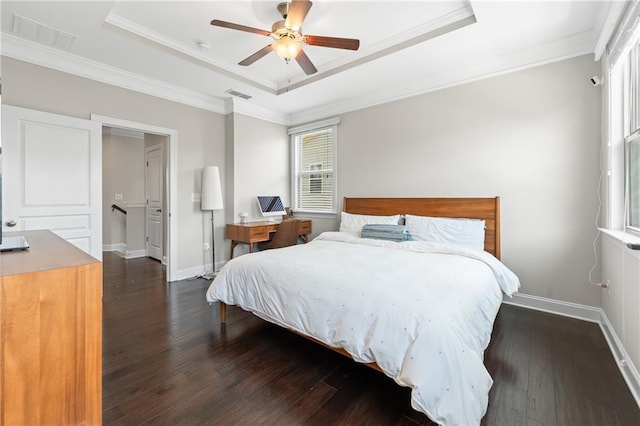 4458 Dunblane Ave, Sugar Hill, GA 30518 - bedroom featuring a tray ceiling, wood finished floors, ornamental molding, and a ceiling fan