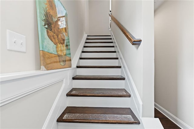 4458 Dunblane Ave, Sugar Hill, GA 30518 - stairs featuring wood finished floors
