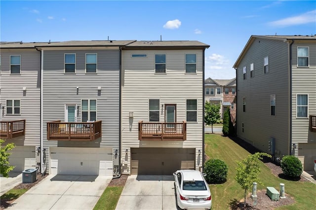 4458 Dunblane Ave, Sugar Hill, GA 30518 - back of property with an attached garage and concrete driveway