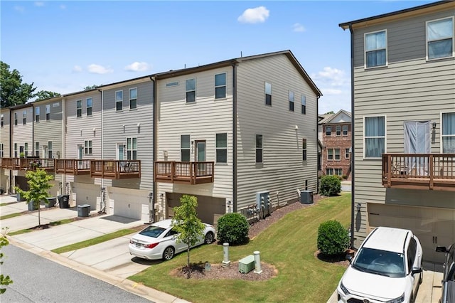 4458 Dunblane Ave, Sugar Hill, GA 30518 - view of front of home featuring a garage, a front yard, and concrete driveway