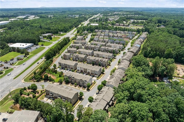 4458 Dunblane Ave, Sugar Hill, GA 30518 - aerial view of property and surrounding area with a heavily wooded area