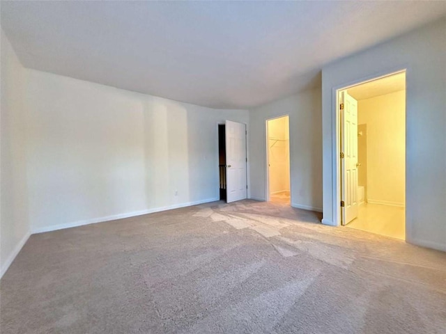 3533 Mulberry Way, Duluth, GA 30096 - unfurnished bedroom with carpet flooring, a spacious closet, ensuite bathroom, and a closet