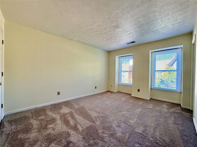3533 Mulberry Way, Duluth, GA 30096 - spare room featuring a textured ceiling and carpet flooring