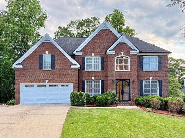 6765 Crofton Dr, Alpharetta, GA 30005 - colonial home featuring driveway, a garage, brick siding, and a front yard