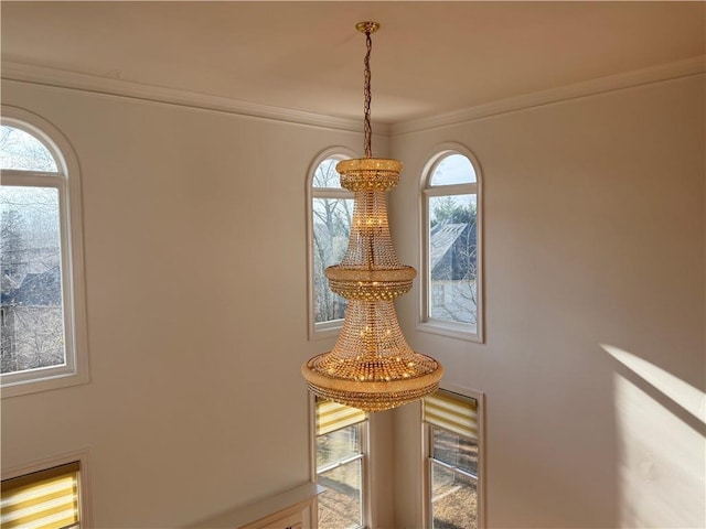 6765 Crofton Dr, Alpharetta, GA 30005 - detailed view of a chandelier and crown molding