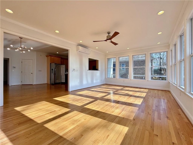 6765 Crofton Dr, Alpharetta, GA 30005 - unfurnished room featuring a wall mounted AC, ornamental molding, light wood-style floors, a chandelier, and baseboards