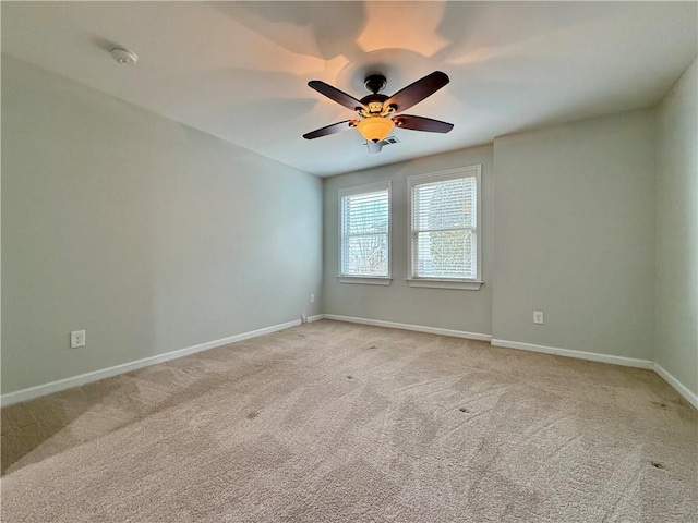 6765 Crofton Dr, Alpharetta, GA 30005 - unfurnished room with light colored carpet, a ceiling fan, baseboards, and a smoke detector