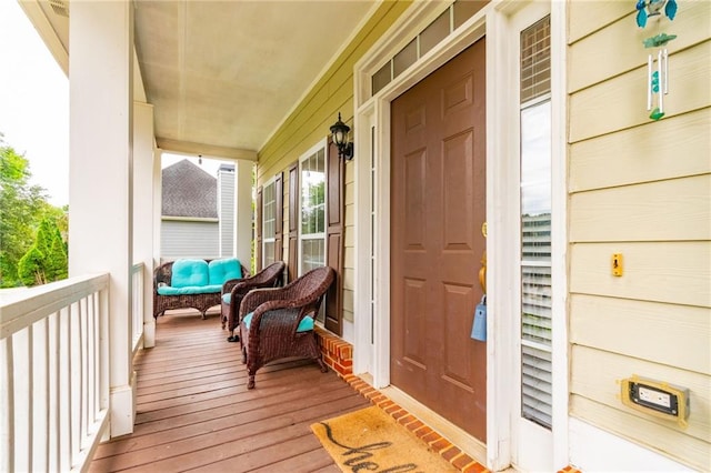doorway to property with a porch
