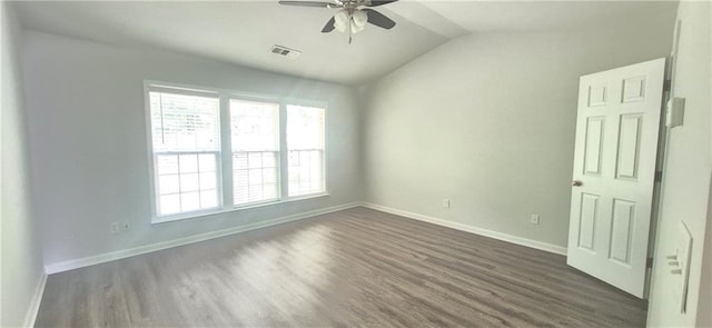 2061 Fosco Dr, Duluth, GA 30097 - unfurnished room with ceiling fan, dark wood-type flooring, healthy amount of natural light, vaulted ceiling, and baseboards