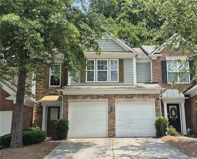 2061 Fosco Dr, Duluth, GA 30097 - multi unit property with an attached garage, driveway, and stone siding