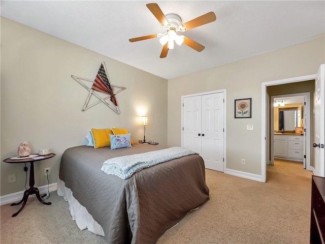 bedroom with a ceiling fan, baseboards, a closet, and light colored carpet