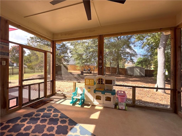 sunroom with a ceiling fan