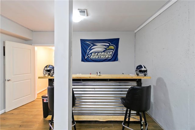 325 Stonecastle Pass, South Fulton, GA 30331 - bar featuring a bar, visible vents, and wood finished floors