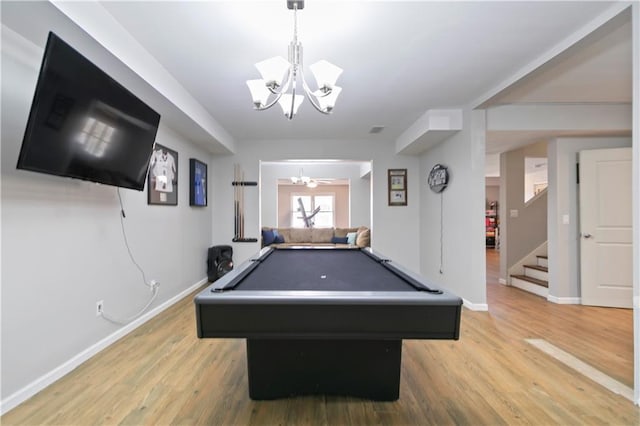 325 Stonecastle Pass, South Fulton, GA 30331 - playroom with baseboards, light wood-style flooring, and a notable chandelier
