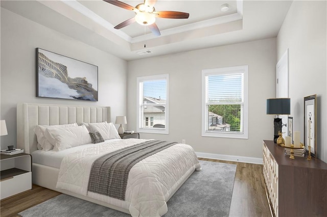 3657 Atherton Park Ct, Suwanee, GA 30024 - bedroom with a tray ceiling, wood finished floors, and ceiling fan