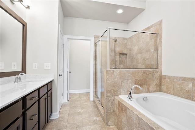 3657 Atherton Park Ct, Suwanee, GA 30024 - full bath with vanity, a bath, a shower stall, and recessed lighting