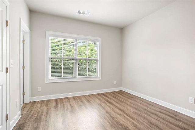 3657 Atherton Park Ct, Suwanee, GA 30024 - unfurnished room featuring wood finished floors and baseboards
