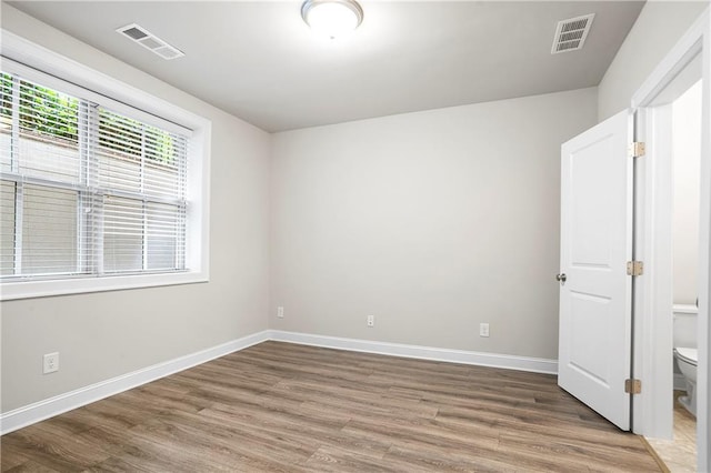 3657 Atherton Park Ct, Suwanee, GA 30024 - unfurnished bedroom featuring wood finished floors