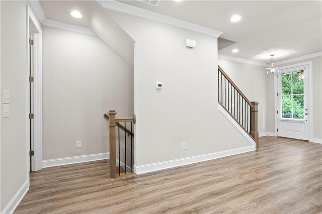 3657 Atherton Park Ct, Suwanee, GA 30024 - entryway with light wood-type flooring, recessed lighting, crown molding, and stairway