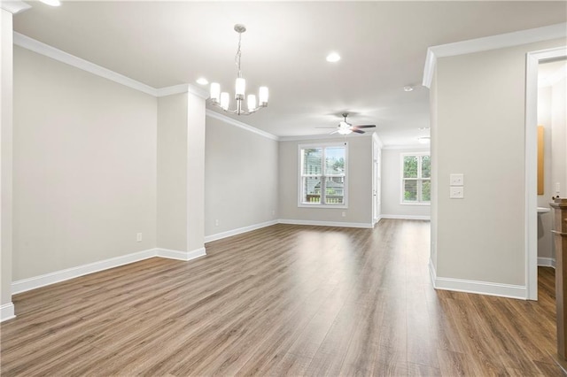3657 Atherton Park Ct, Suwanee, GA 30024 - unfurnished room with ornamental molding, a chandelier, wood finished floors, ceiling fan, and recessed lighting