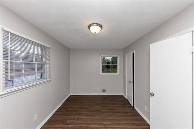 1338 Georgia Ave, Atlanta, GA 30344 - empty room featuring dark wood-style floors and baseboards
