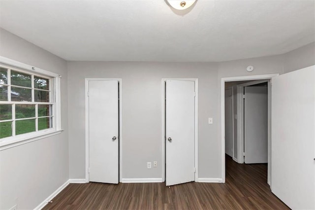 1338 Georgia Ave, Atlanta, GA 30344 - unfurnished bedroom with wood finished floors and baseboards