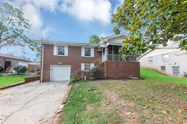 1338 Georgia Ave, Atlanta, GA 30344 - view of front of home featuring brick siding, a sunroom, driveway, a garage, and a front yard