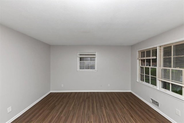 1338 Georgia Ave, Atlanta, GA 30344 - empty room with wood finished floors and baseboards